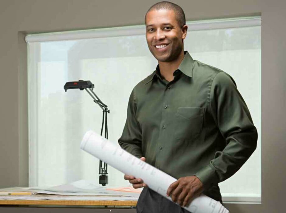 Man holding a site plan