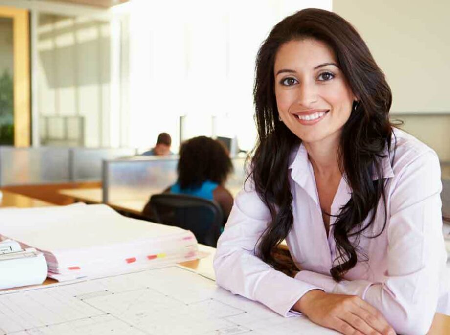 Woman reading a site plan