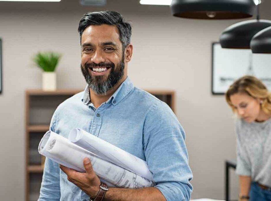 Planner holding site plans