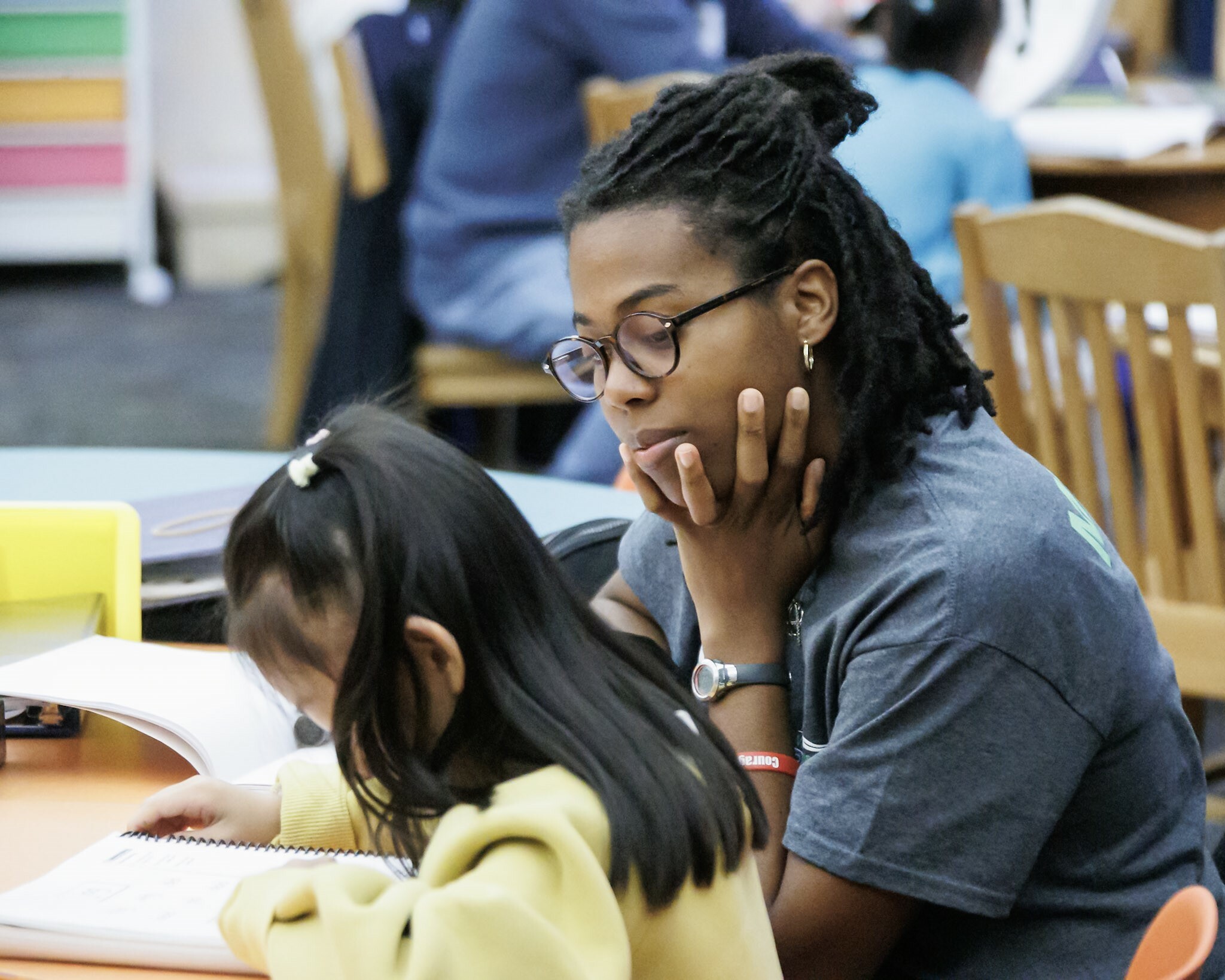 First Grade READS mentor and a student