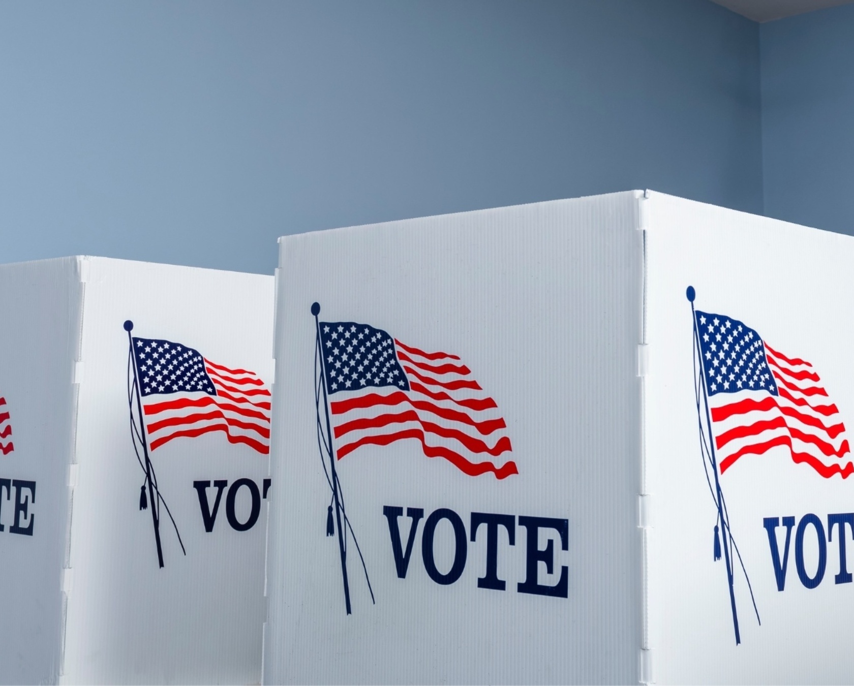 Voter booth and american flag
