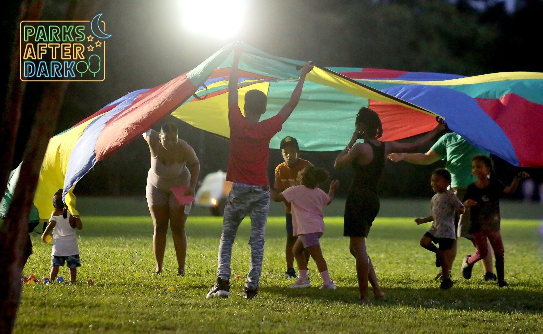 Family playing at Parks After Dark