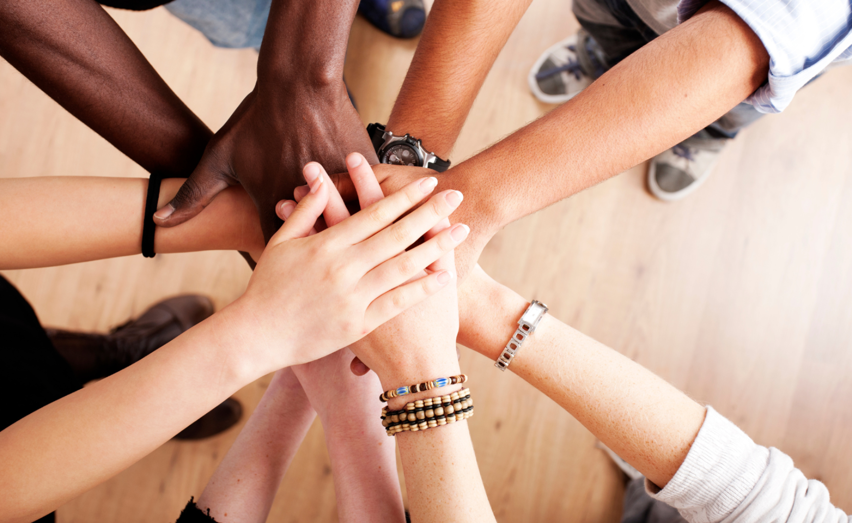 Group of hands in a hand stack