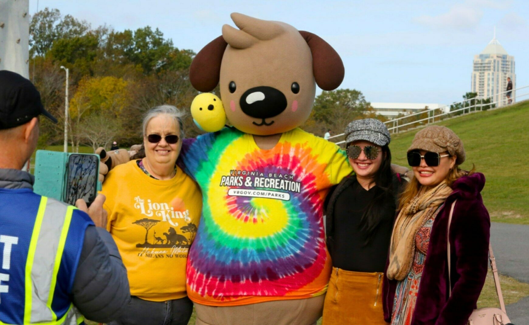 People posing for picture with VBPR mascots Barks and Rex