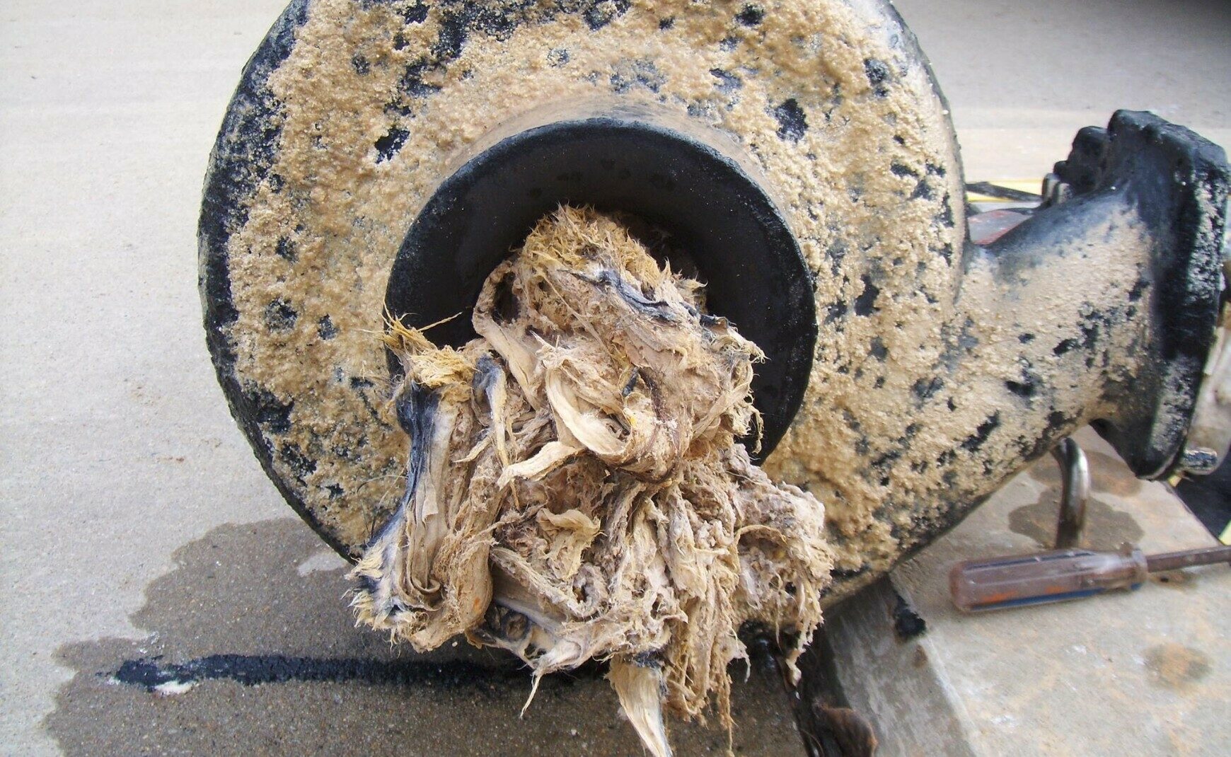 Sanitary sewer pump clogged with wipes