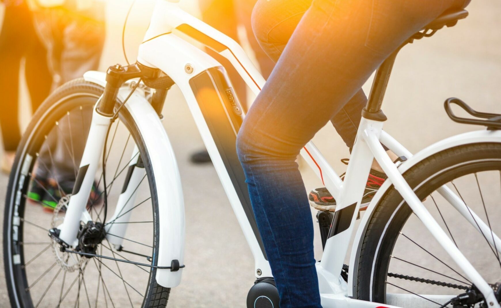 Close up of person sitting on e bike