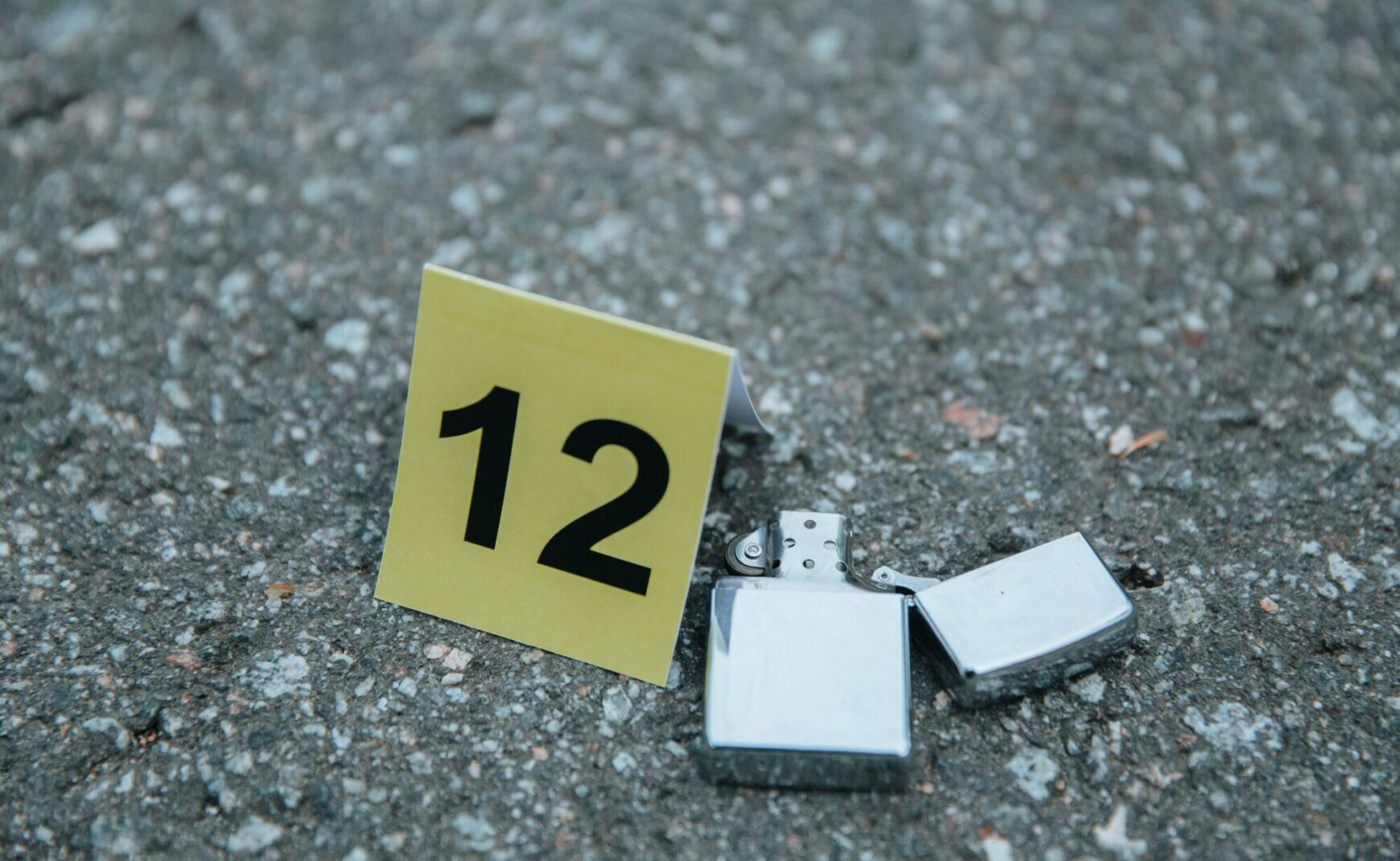 Forensics marker 12 and silver lighter