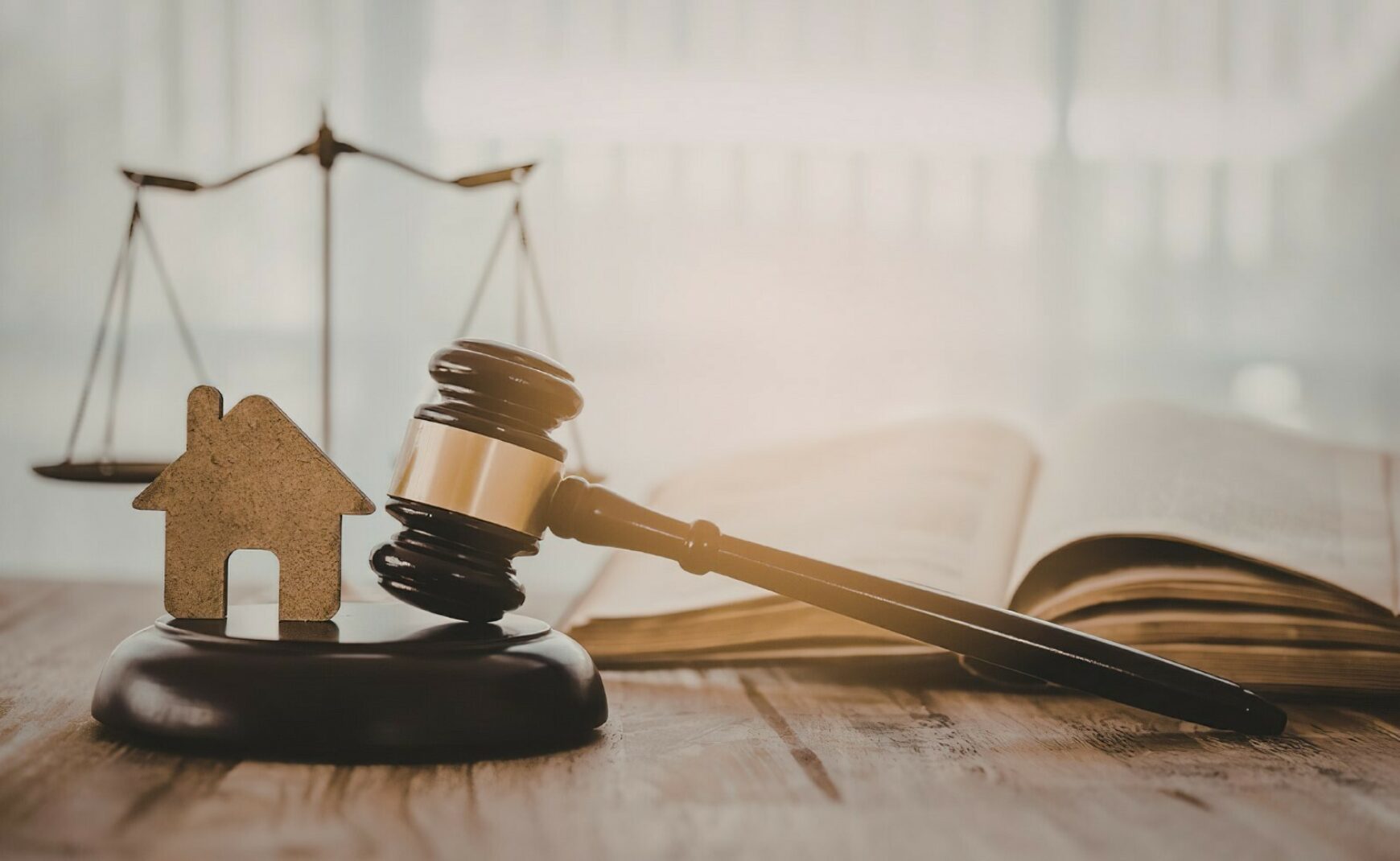 Gavel and a house representing fair housing