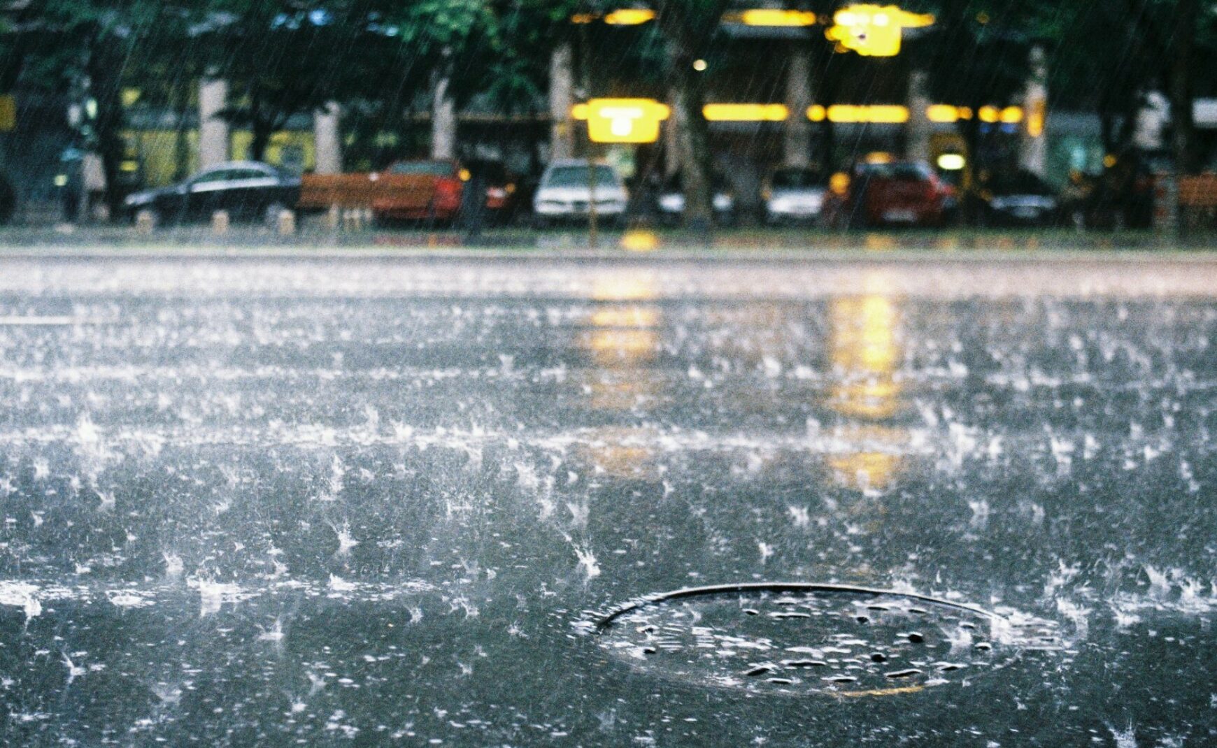 Storm drain with rainy background
