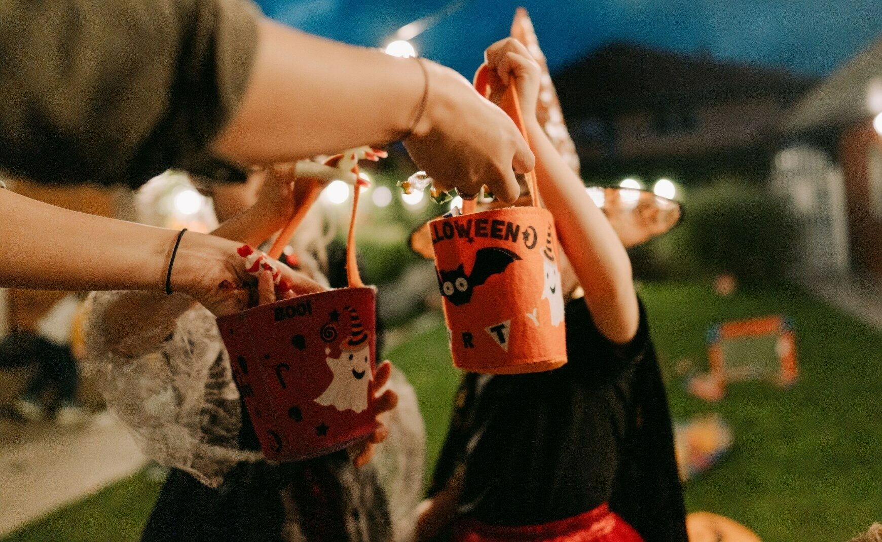 Trick or treaters getting candy