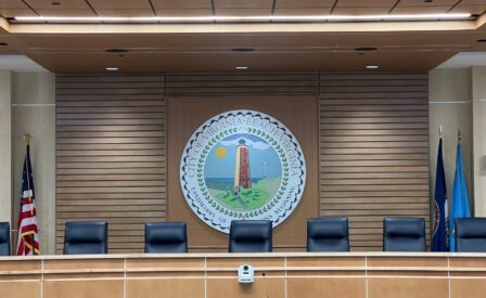 City of Virginia Beach seal on wall behind Council dais