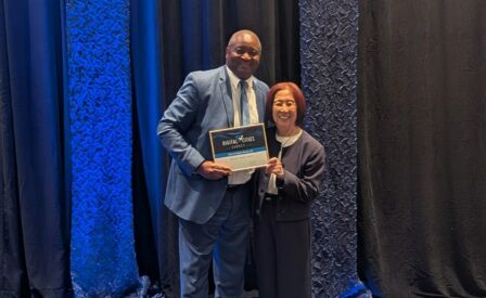 IT Department staff accepting Digital Cities Survey Award