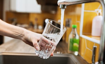 Tap water filling into glass
