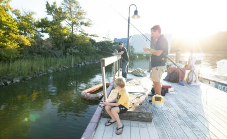 Men and boy fishing at the Virginia Aquarium