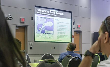 Training attendees viewing powerpoint on emergency preparedness