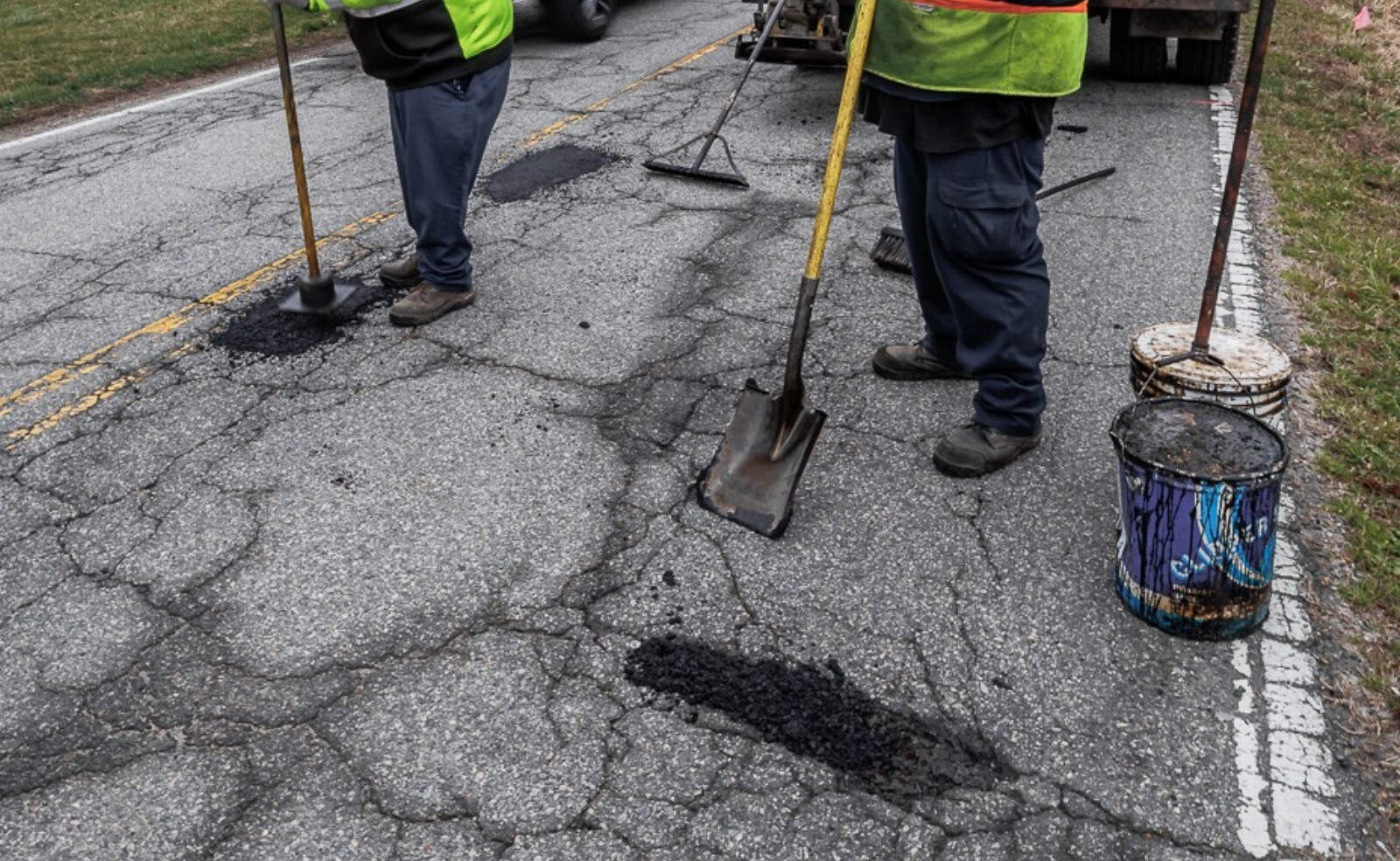 Stamping asphalt to repair pothole