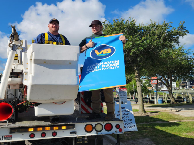 Lynhaven Boat ramp flags being installed