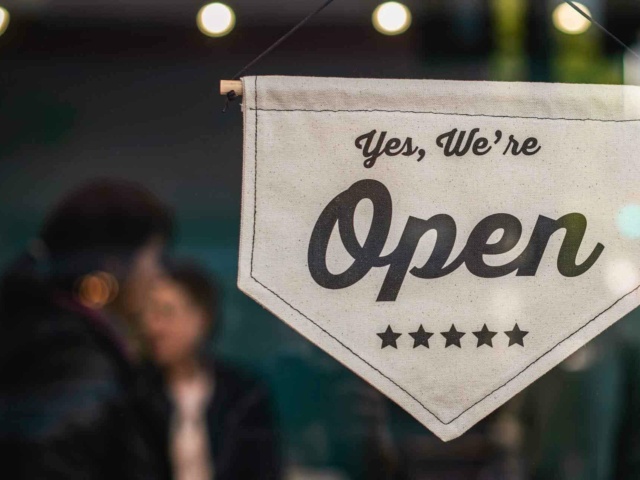 We are Open Sign in Window