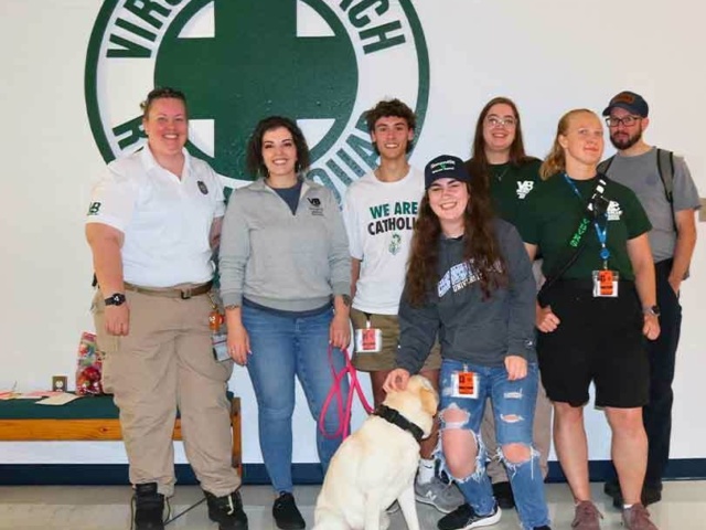 Members take a break during a cookout at R8 during EMS Week