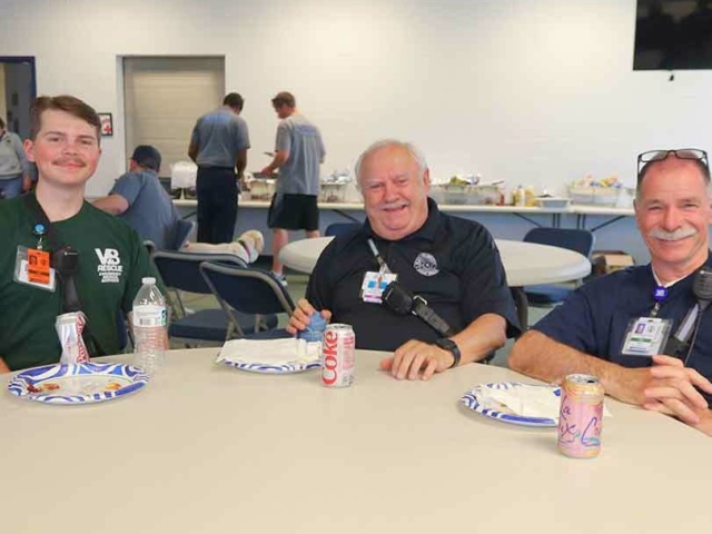 VBEMS members take a break during a cookout at R8 celebrating EMS Week