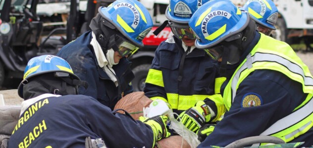 Paramedics Practicing on Dummy