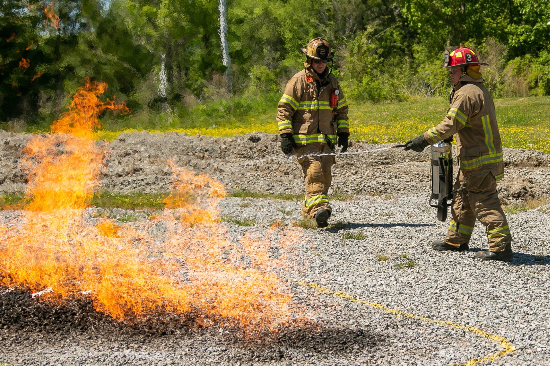 Firefighters practicing to extinguish a natrual gas fire