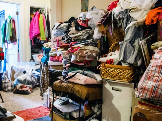 Clothes Piled to the Ceiling