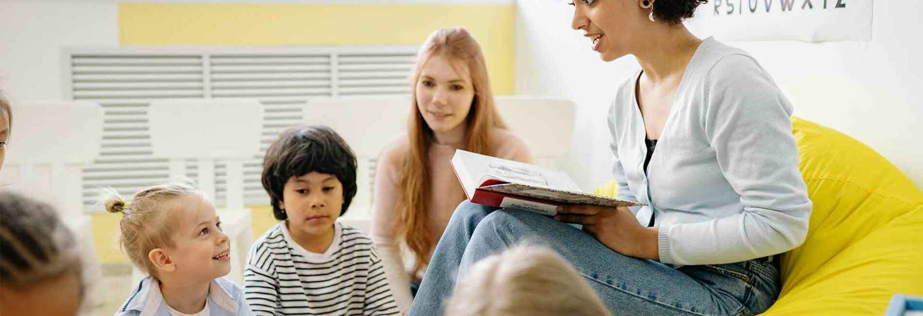 Teacher reading to children