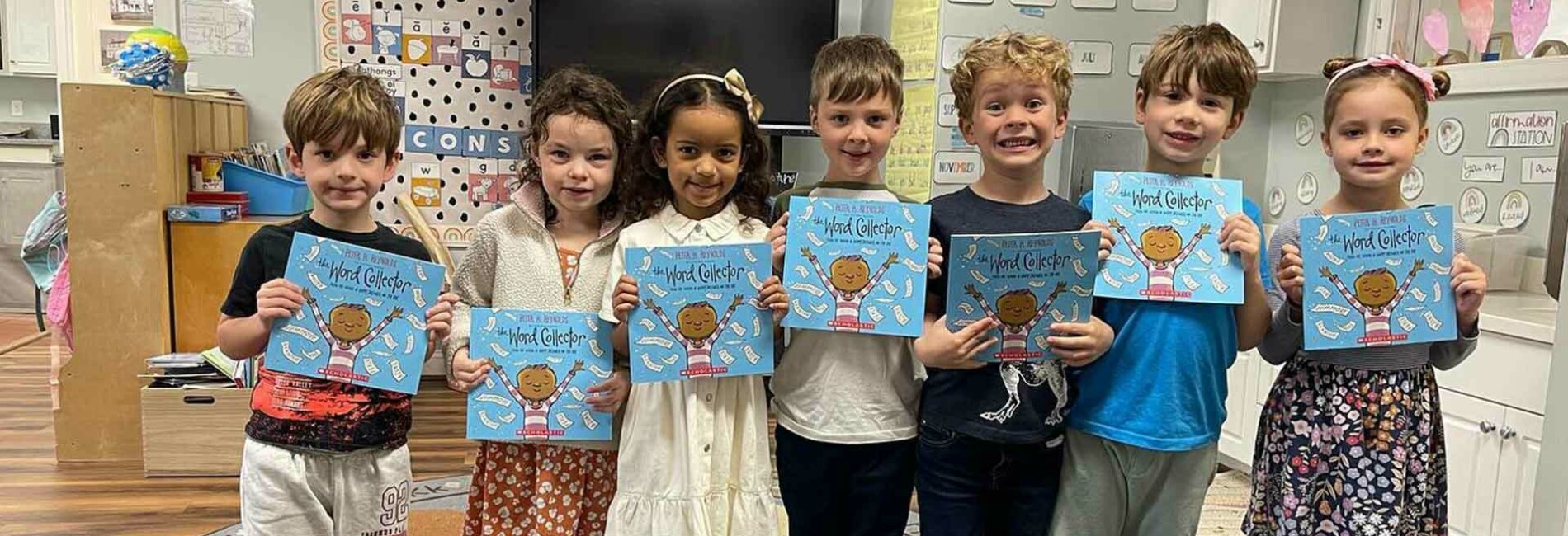 Children holding books
