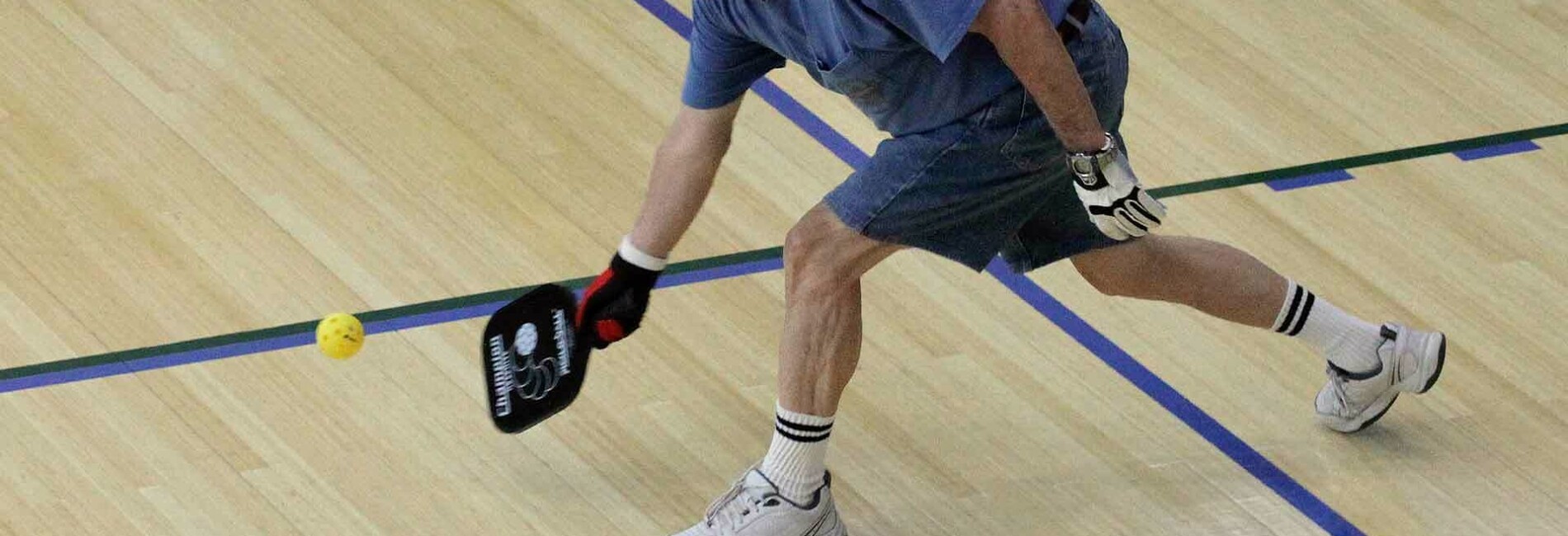 Person playing Pickleball