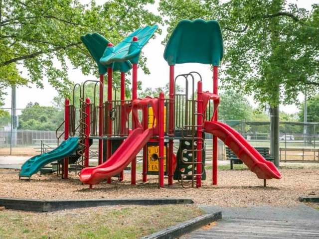 City view park red and green city view park playground climbing structures