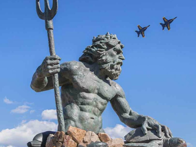 King Neptune with Blue Angels in the sky