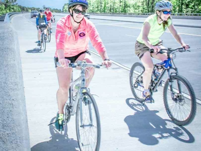 People riding bicycles