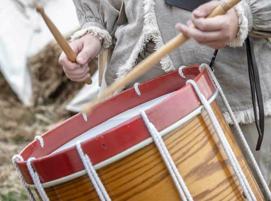 Man playing on drum