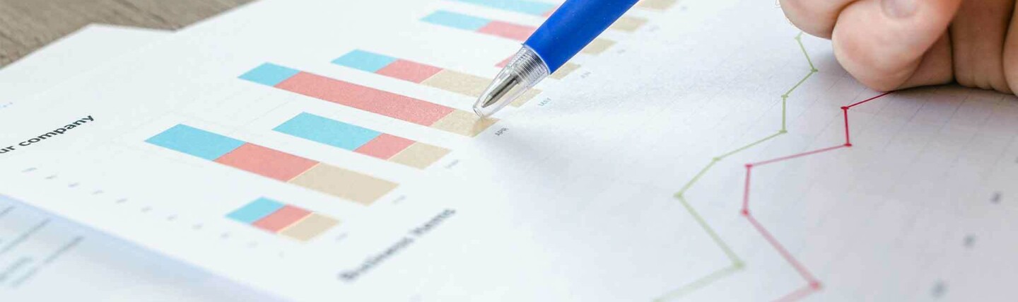 Person evaluating charts