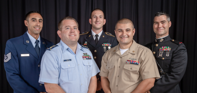 Five VBPD police officers in military service uniforms from each branch