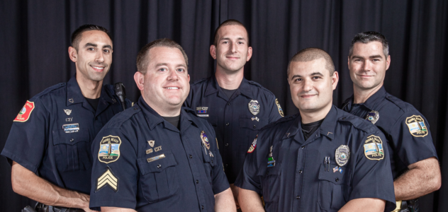 Five police officers in VBPD uniforms